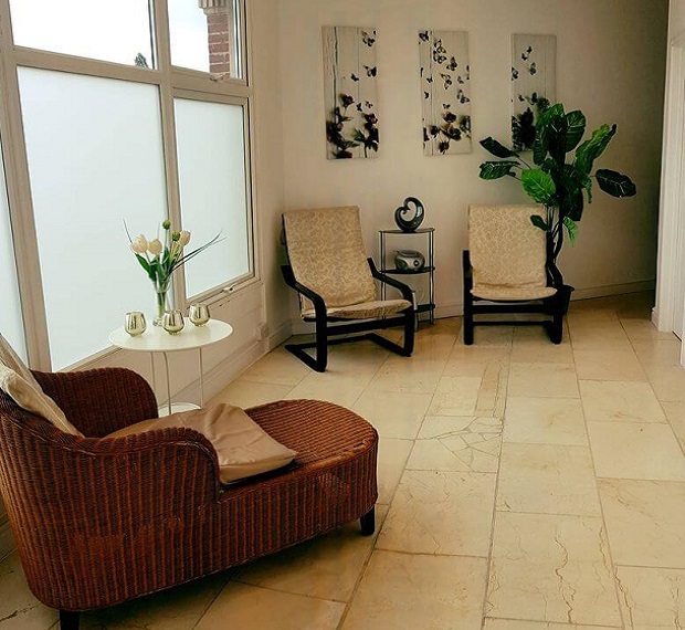 The spacious landing area where you can sit and relax with friends. Treatment room 2